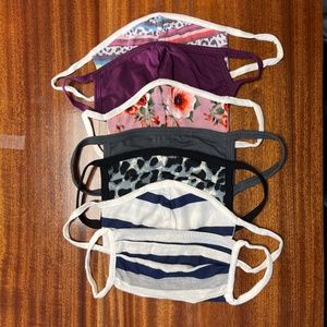 Unworn, NEW Assorted face masks. 7 masks total. Each one Double layer.